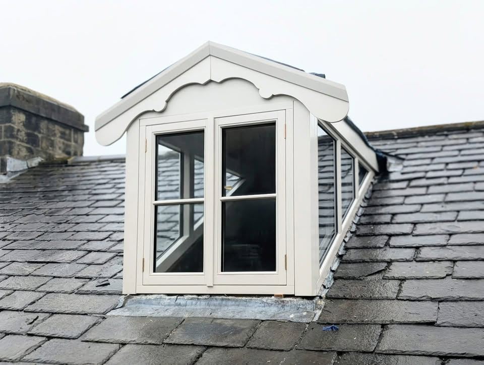 Bespoke timber dormer window built by KA Green Joinery on a slate roof